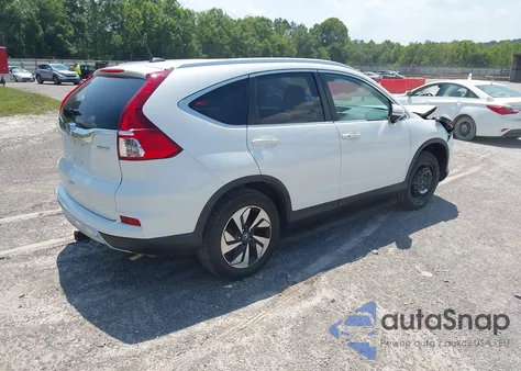2016 Honda Cr-V Touring z USA, uszkodzony, nr VIN 5J6RM4H95GL118070